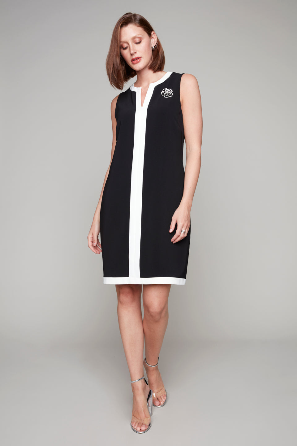 Compli K Noir sleeveless sheath dress with camelia brooch detail