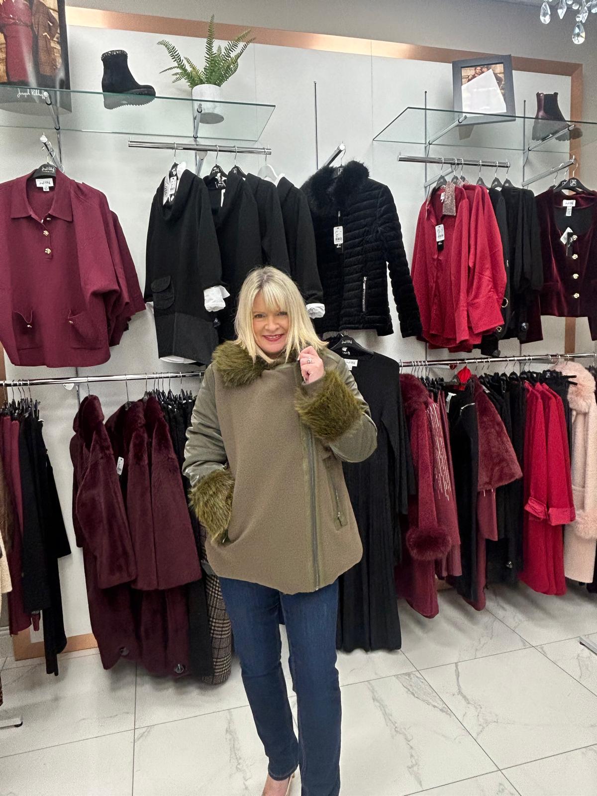 Carla Ruiz green fur coat