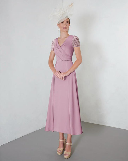 Mother of the bride/groom/special occasion. Soft pink dress with diamond sleeves.