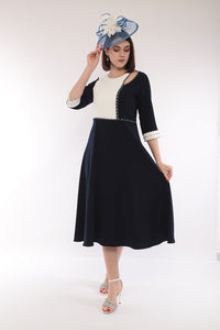 Lizabella navy dress with keyhole cut out .