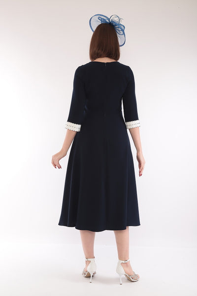 Lizabella navy dress with keyhole cut out .