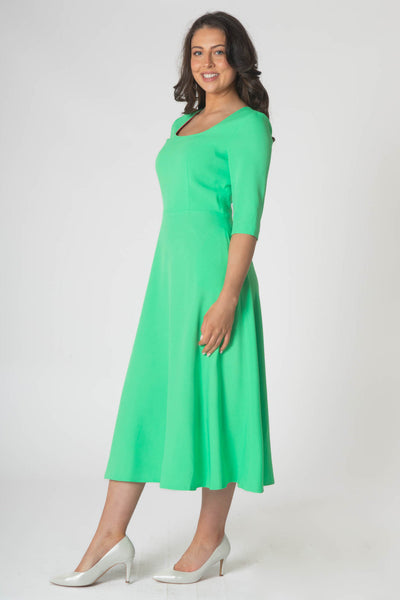 Porsha dress with round neck and contrast lining . Green/pink