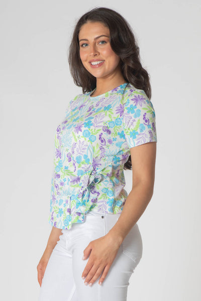 Esper printed top with tie hem and short sleeves purple and green.