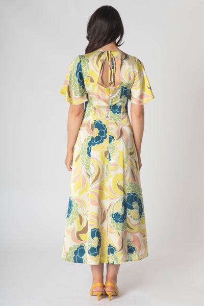 Caprice v-neck dress with Empire waist and loose half sleeve. Lemon multi