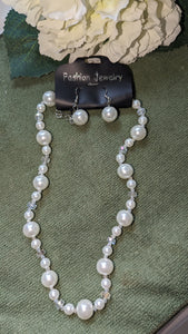 White pearl necklace and earrings