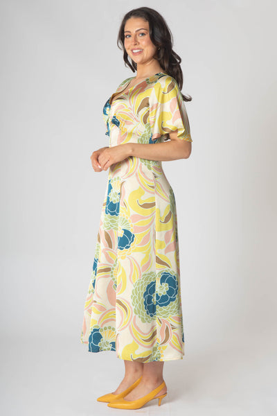 Caprice v-neck dress with Empire waist and loose half sleeve. Lemon multi