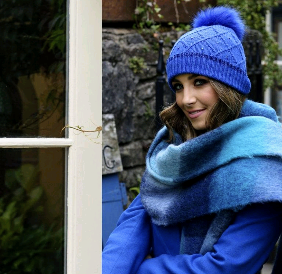 Royal blue pom pom hat